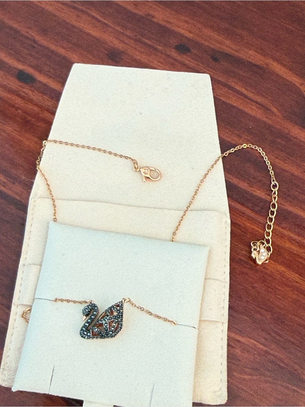 Swarovski Gold-Tone Swan Necklace with Dark Crystals